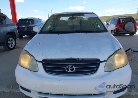 2004 Toyota Corolla Le from USA, damaged, VIN 1NXBR32E84Z285887